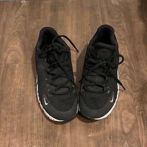 Nike Black Athletic Running Shoes with White Accents